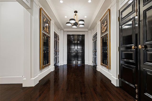2 Fargo Ln, Irvington, NY 10533 - entryway with a chandelier, wood finished floors, ornamental molding, a decorative wall, and recessed lighting
