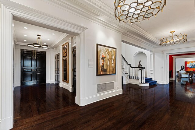 2 Fargo Ln, Irvington, NY 10533 - hall featuring a chandelier, ornamental molding, stairs, hardwood / wood-style floors, and baseboards