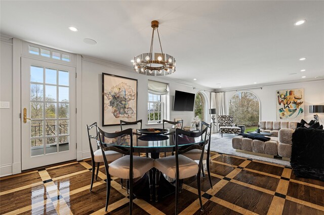 2 Fargo Ln, Irvington, NY 10533 - dining room featuring recessed lighting, a chandelier, healthy amount of natural light, crown molding, and wood finished floors