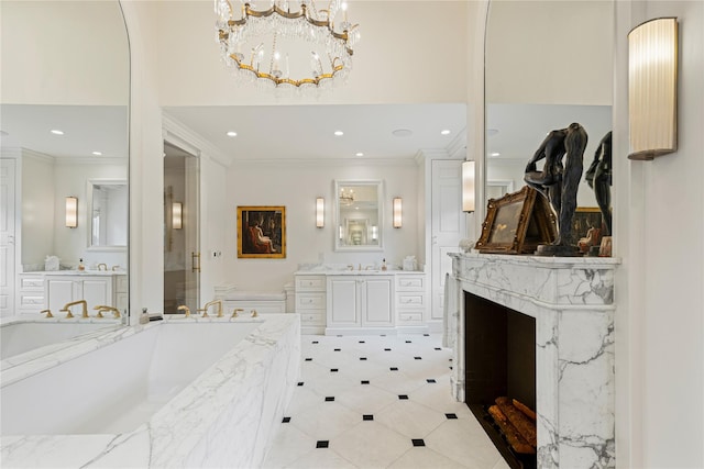 2 Fargo Ln, Irvington, NY 10533 - bathroom with ornamental molding, recessed lighting, a garden tub, two vanities, and a chandelier