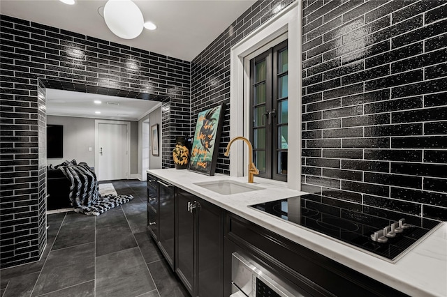 2 Fargo Ln, Irvington, NY 10533 - kitchen with a sink, black electric cooktop, recessed lighting, dark cabinets, and oven