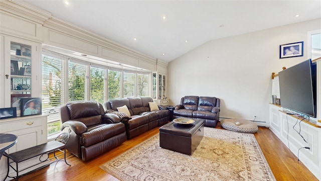 3359 Knight St, Oceanside, NY 11572 - living area featuring baseboard heating, wood finished floors, and lofted ceiling