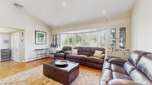 3359 Knight St, Oceanside, NY 11572 - living area featuring visible vents, light wood-style flooring, baseboard heating, and high vaulted ceiling