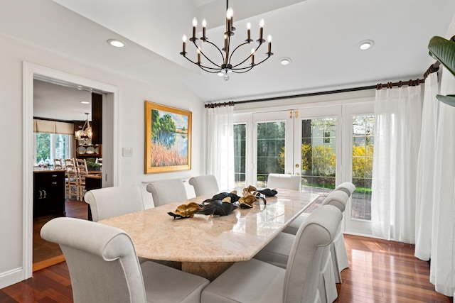 dining space with recessed lighting, french doors, a chandelier, and dark wood-type flooring