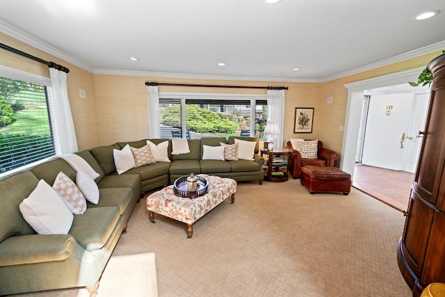 carpeted living area featuring a healthy amount of sunlight, recessed lighting, and ornamental molding