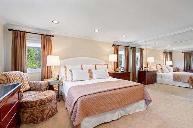 bedroom with crown molding, recessed lighting, and light carpet