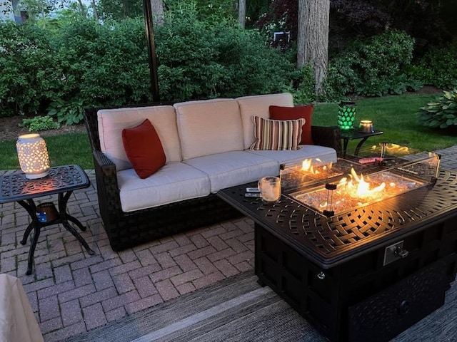 view of patio featuring an outdoor fire pit