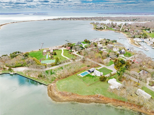 aerial view of property's location featuring a nearby body of water