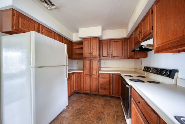 kitchen featuring white appliances, under cabinet range hood, brown cabinetry, and light countertops