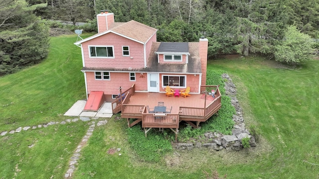 85 Woodard Rd, Parksville, NY 12768 - rear view of property with a chimney, a wooden deck, and a lawn