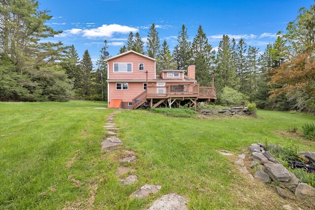 85 Woodard Rd, Parksville, NY 12768 - rear view of house featuring a deck, a lawn, and a chimney