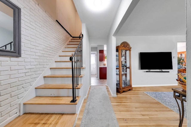 7 Hedge Ln, Centereach, NY 11720 - staircase featuring baseboards, wood finished floors, and a healthy amount of sunlight