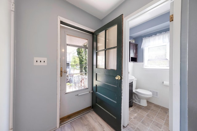 7 Hedge Ln, Centereach, NY 11720 - interior space featuring visible vents, toilet, and vanity