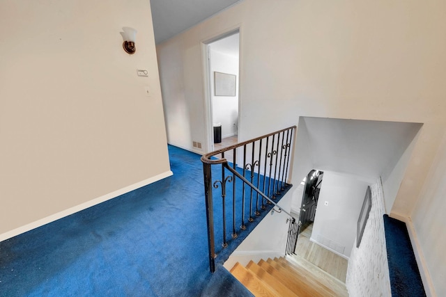 7 Hedge Ln, Centereach, NY 11720 - stairs featuring baseboards, visible vents, and carpet