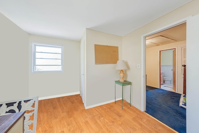 7 Hedge Ln, Centereach, NY 11720 - interior space with baseboards and light wood finished floors