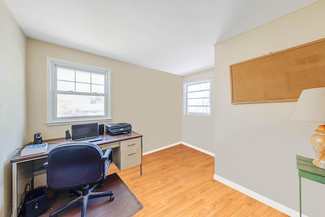 7 Hedge Ln, Centereach, NY 11720 - office area with baseboards and light wood-type flooring