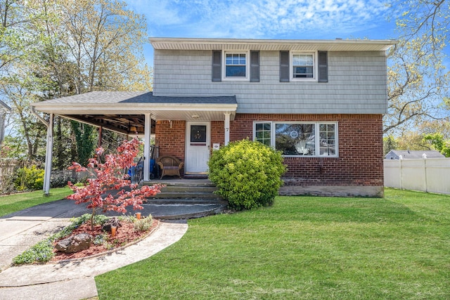 7 Hedge Ln, Centereach, NY 11720 - view of front of house with covered porch, brick siding, fence, and a front lawn