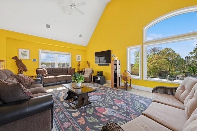 10 Delta Rd, Massapequa, NY 11758 - living area with high vaulted ceiling, ceiling fan, and wood finished floors