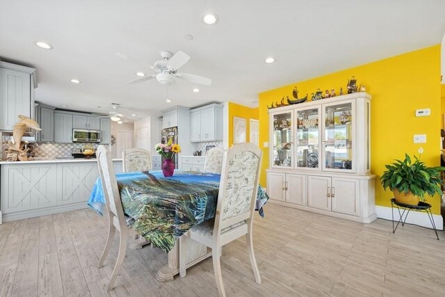 10 Delta Rd, Massapequa, NY 11758 - dining space with a ceiling fan, recessed lighting, and light wood-style floors