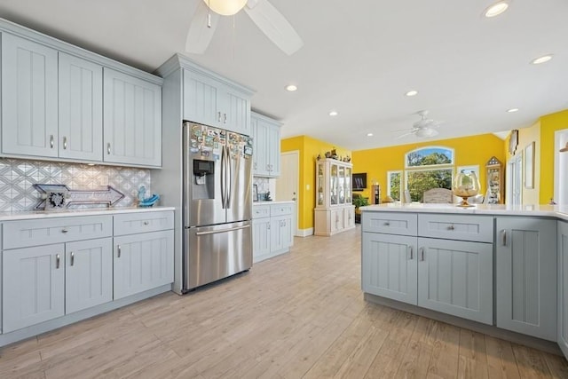 10 Delta Rd, Massapequa, NY 11758 - kitchen featuring stainless steel refrigerator with ice dispenser, a ceiling fan, gray cabinets, recessed lighting, and light wood-style flooring