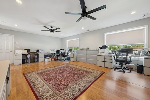 10 Delta Rd, Massapequa, NY 11758 - office featuring a ceiling fan, plenty of natural light, light wood-type flooring, and recessed lighting