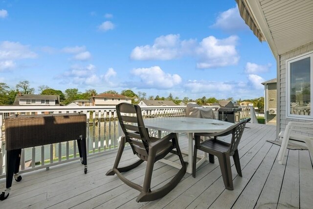 10 Delta Rd, Massapequa, NY 11758 - deck with outdoor dining space