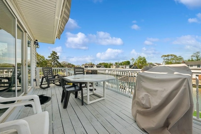 10 Delta Rd, Massapequa, NY 11758 - wooden deck featuring outdoor dining area and grilling area