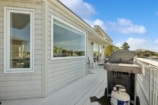 10 Delta Rd, Massapequa, NY 11758 - wooden terrace featuring grilling area