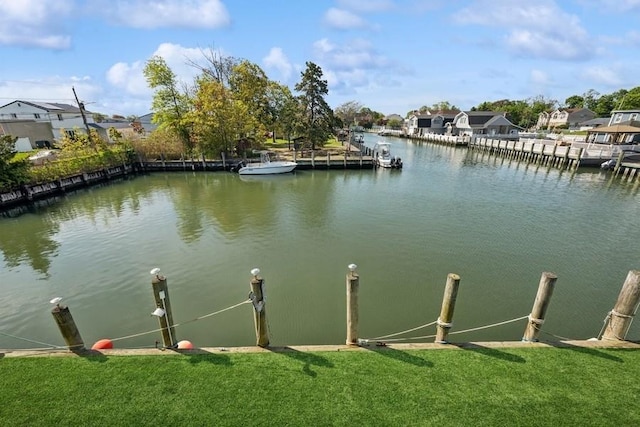 10 Delta Rd, Massapequa, NY 11758 - dock area featuring a water view and a lawn