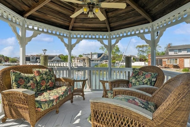 10 Delta Rd, Massapequa, NY 11758 - sunroom / solarium featuring a ceiling fan, a residential view, and a water view