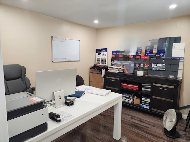 office with dark wood-style floors and recessed lighting