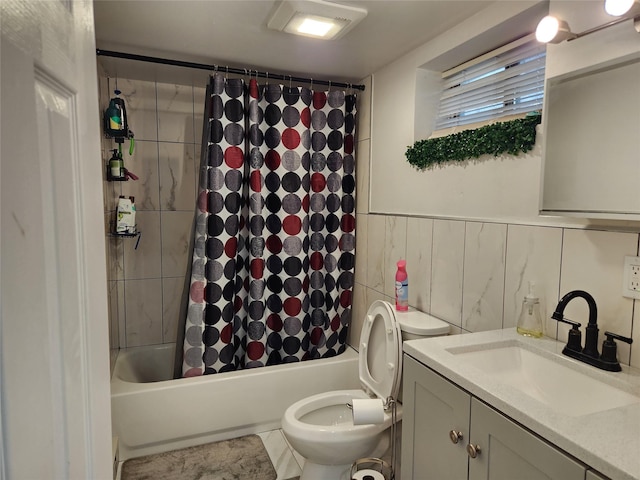 bathroom featuring shower / bath combo, vanity, and toilet