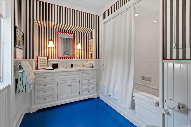 bathroom with vanity, shower / tub combo with curtain, and crown molding