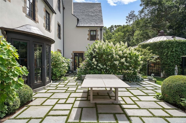 view of patio / terrace featuring french doors and outdoor dining space