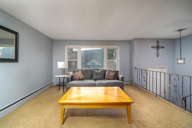 living area with a baseboard radiator and light colored carpet