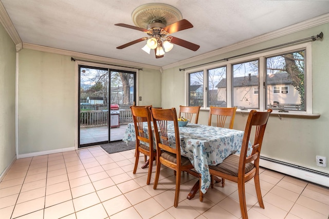 dining room with a ceiling fan, ornamental molding, and a healthy amount of sunlight