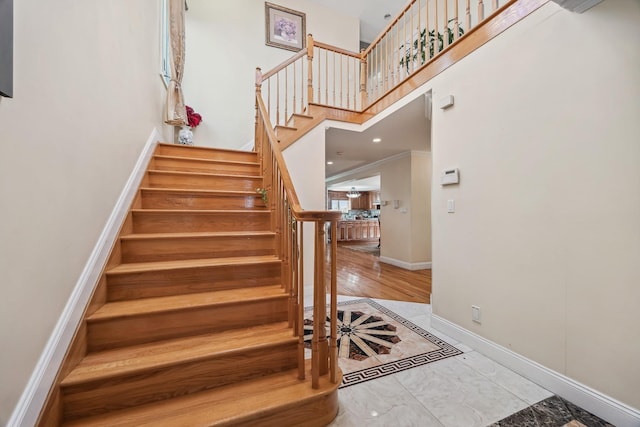 154-60 Riverside Dr, Whitestone, NY 11357 - staircase featuring a towering ceiling, baseboards, and marble finish floor