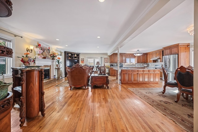 154-60 Riverside Dr, Whitestone, NY 11357 - living room featuring a high end fireplace, recessed lighting, ornamental molding, and light wood-type flooring