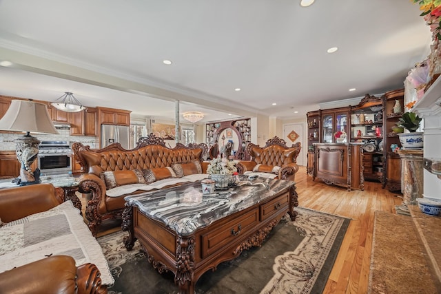 154-60 Riverside Dr, Whitestone, NY 11357 - living room with a fireplace, light wood-style floors, crown molding, and recessed lighting