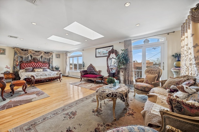 154-60 Riverside Dr, Whitestone, NY 11357 - bedroom featuring wood finished floors, a skylight, access to outside, ornamental molding, and visible vents