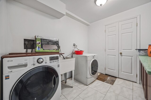 154-60 Riverside Dr, Whitestone, NY 11357 - washroom featuring marble finish floor, washing machine and clothes dryer, and laundry area