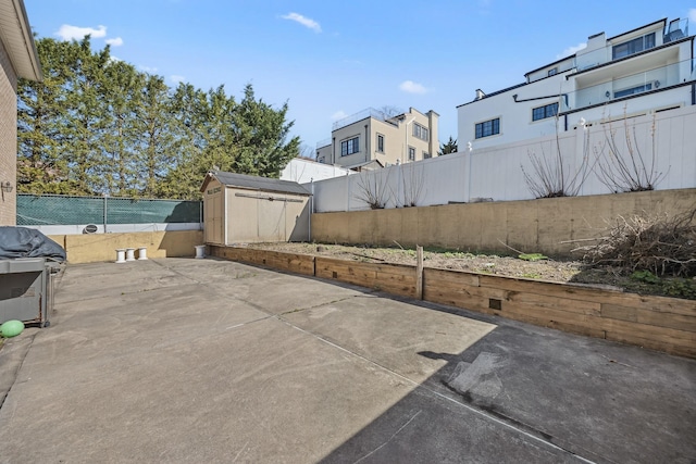 154-60 Riverside Dr, Whitestone, NY 11357 - view of patio / terrace with a fenced backyard, an outbuilding, and a shed