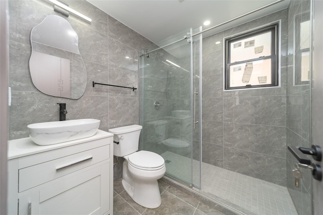 3405 Corporal Kennedy St, Bayside, NY 11361 - bathroom featuring vanity, tile patterned flooring, toilet, tile walls, and a shower stall