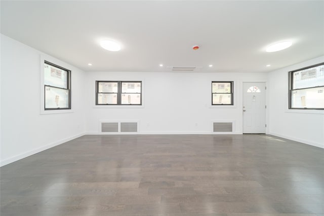 3405 Corporal Kennedy St, Bayside, NY 11361 - empty room featuring recessed lighting, baseboards, visible vents, and dark wood-type flooring
