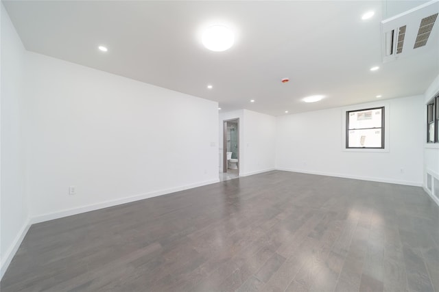 3405 Corporal Kennedy St, Bayside, NY 11361 - empty room featuring visible vents, baseboards, and dark wood-style floors
