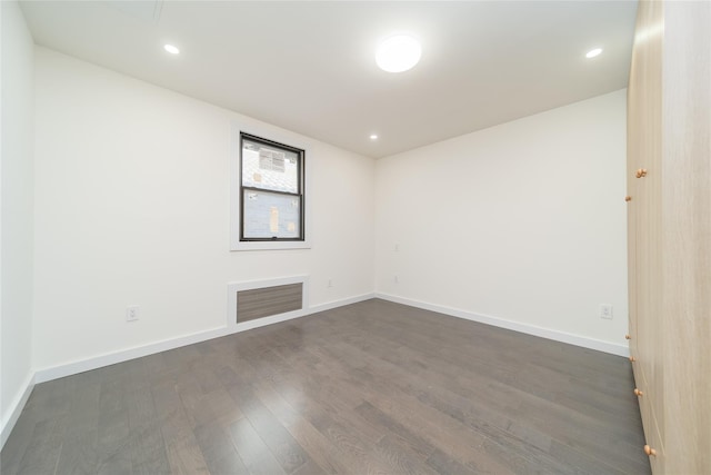 3405 Corporal Kennedy St, Bayside, NY 11361 - unfurnished room featuring visible vents, recessed lighting, baseboards, and dark wood-style floors