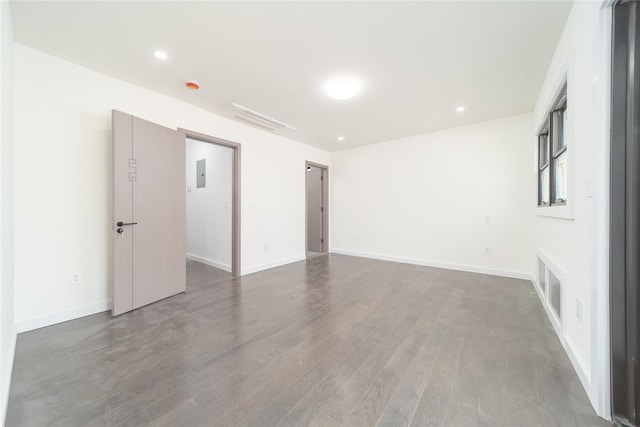 3405 Corporal Kennedy St, Bayside, NY 11361 - empty room featuring recessed lighting, baseboards, dark wood-style flooring, and visible vents