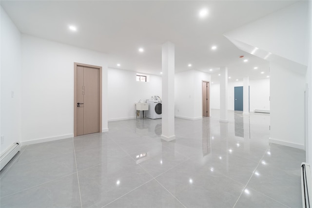 3405 Corporal Kennedy St, Bayside, NY 11361 - interior space featuring light tile patterned floors, baseboard heating, washer / clothes dryer, and a sink