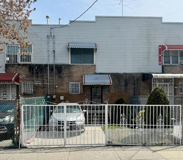 view of building exterior featuring fence