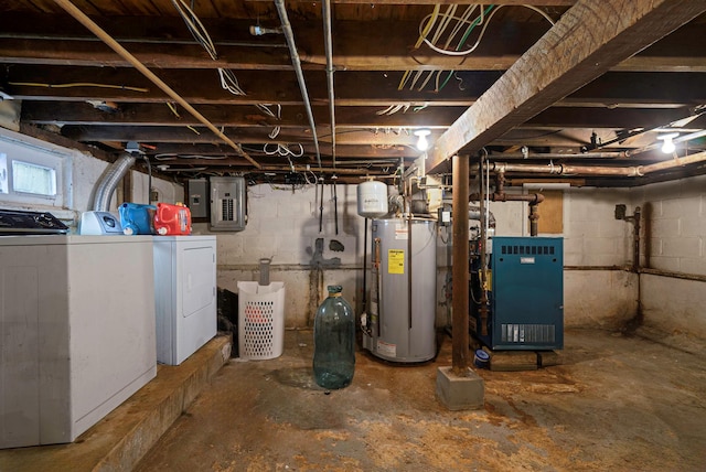 unfinished basement featuring water heater, electric panel, washing machine and clothes dryer, and a heating unit